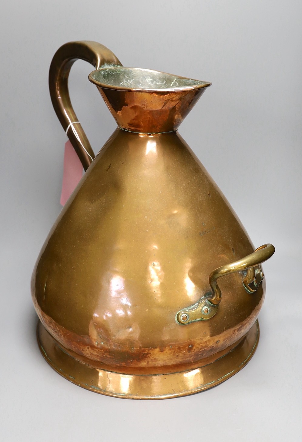 A Victorian copper conical four gallon haystack measure, 44cm tall